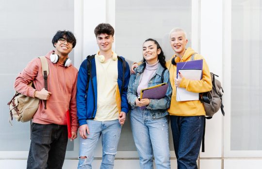College Student friends in the Campus. Students ready to start academic classes of their University